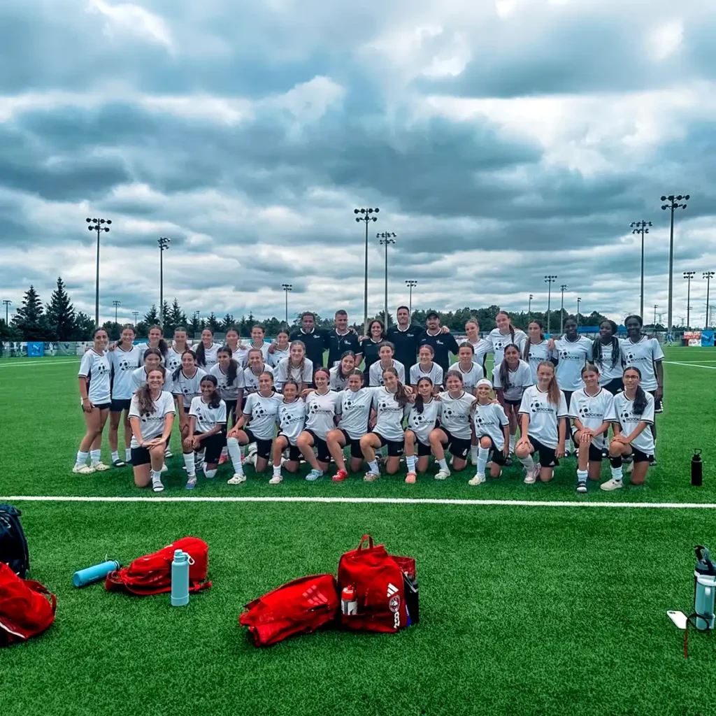 Team and coaching staff group photo at the camp